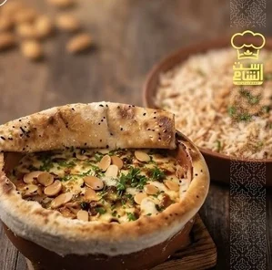 فخارة طاووق بالكريمة والبيستو
